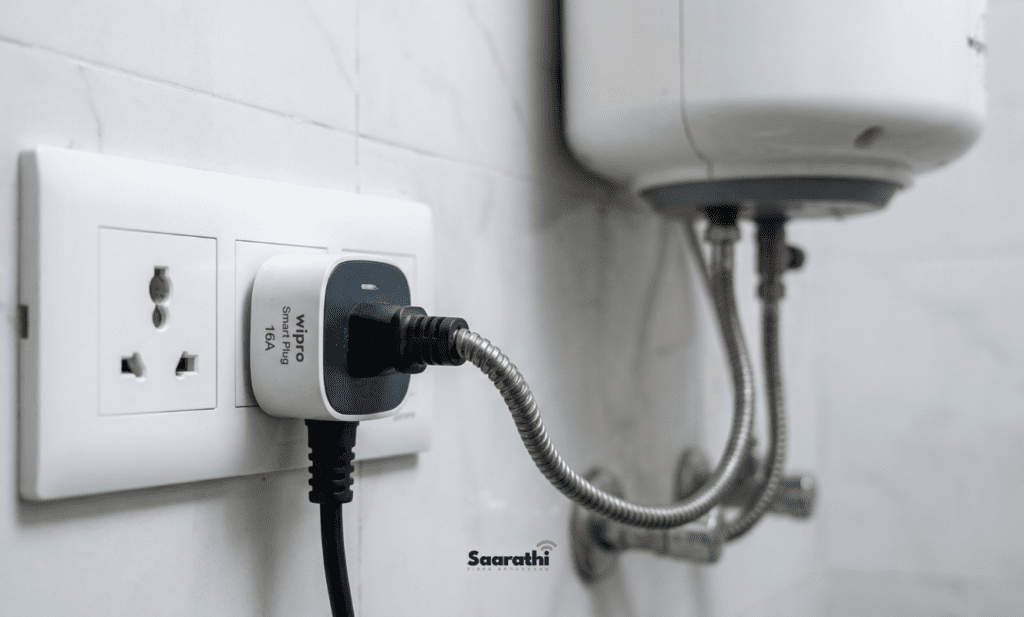 A 16A smart plug connected to a heavy water geyser appliance in a bathroom.